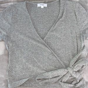 Light grey wrap top.
